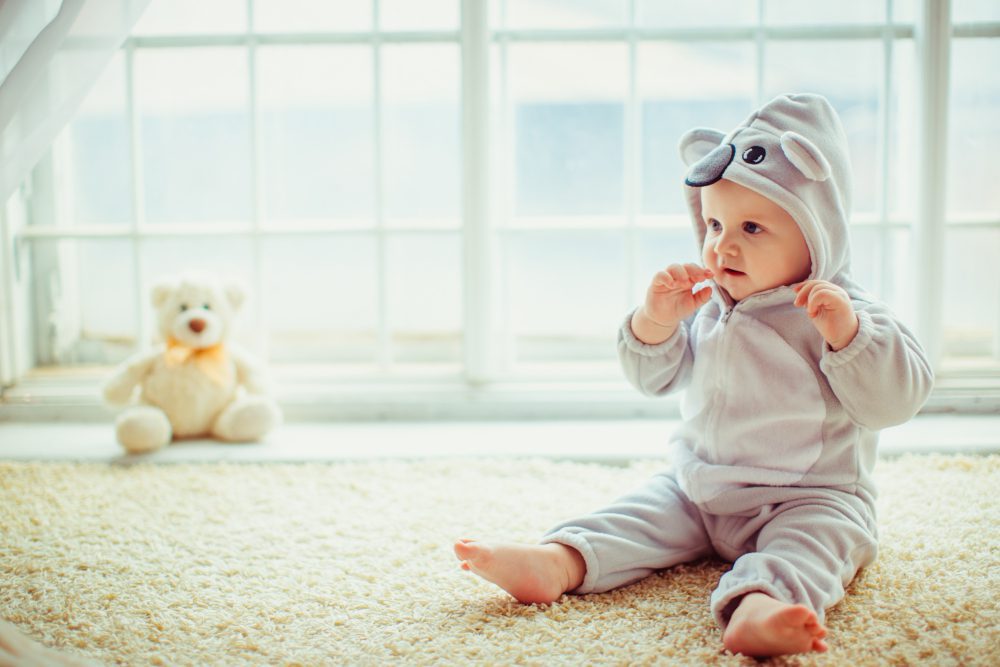 beautiful-little-boy-sitting-by-window - Babies and Moms in Cyprus